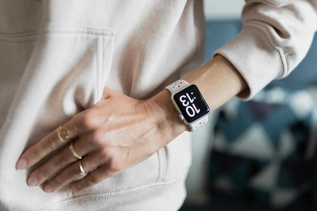 closeup-photo-of-female-hand-looking-clock-time-on-HBUX42R.jpg